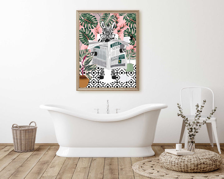 A zebra wearing glasses is sitting on the wc toilet in a colourful pink botanical themed bathroom with a geometric black and white tiled floor reading the newspaper. This is a fun whimsical animal print suited to maximalist eclectic decor.