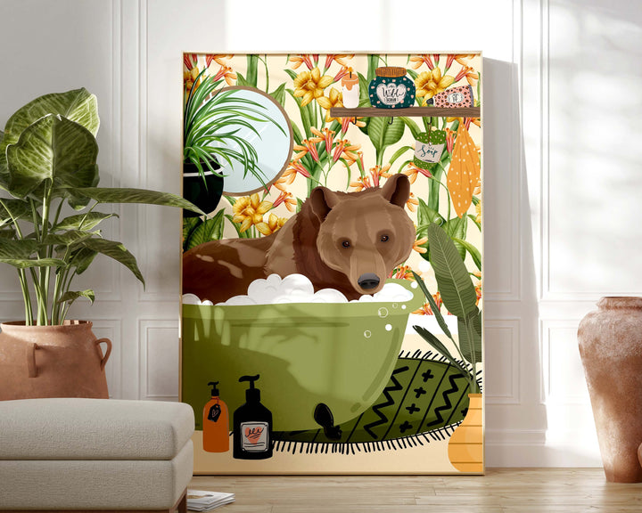 A quirky animal art print of a funny brown bear relaxing in the bathtub in a colourful botanical bathroom.  This modern abstract animal wall art would look great in a kids bathroom, nursery or playroom which has a fun animal or cottage core theme.
